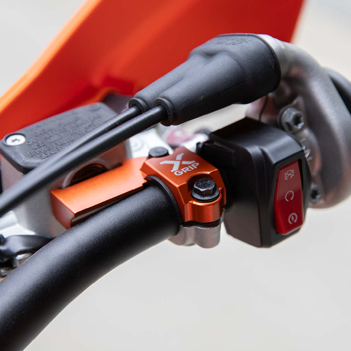 X-GRIP Anti Break Clamp Bremse, orange für BREMBO Armaturen 2014 ->